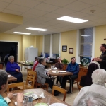 Father Eduardo speaking to the sisters