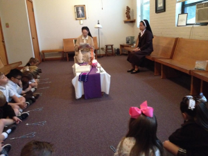 Sr. Cristilyn Rubio, pictured right, with Sr. Judith Hebert and students