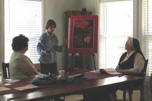 Sr. Catherine Martin telling the story of Elijah through art.